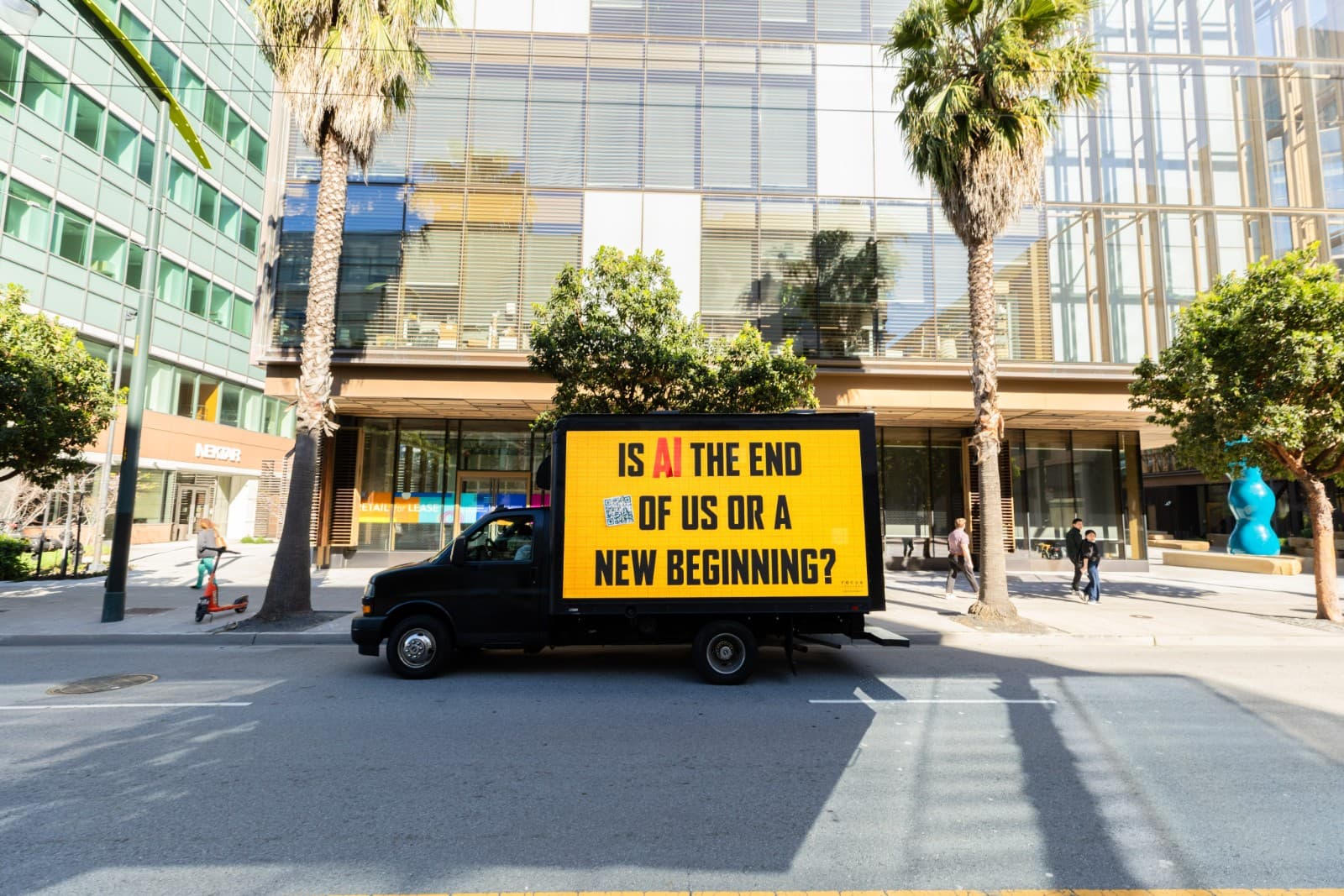 Focus Features AI Doc mobile billboard displaying AI questions near Google campus Silicon Valley by JY Studio