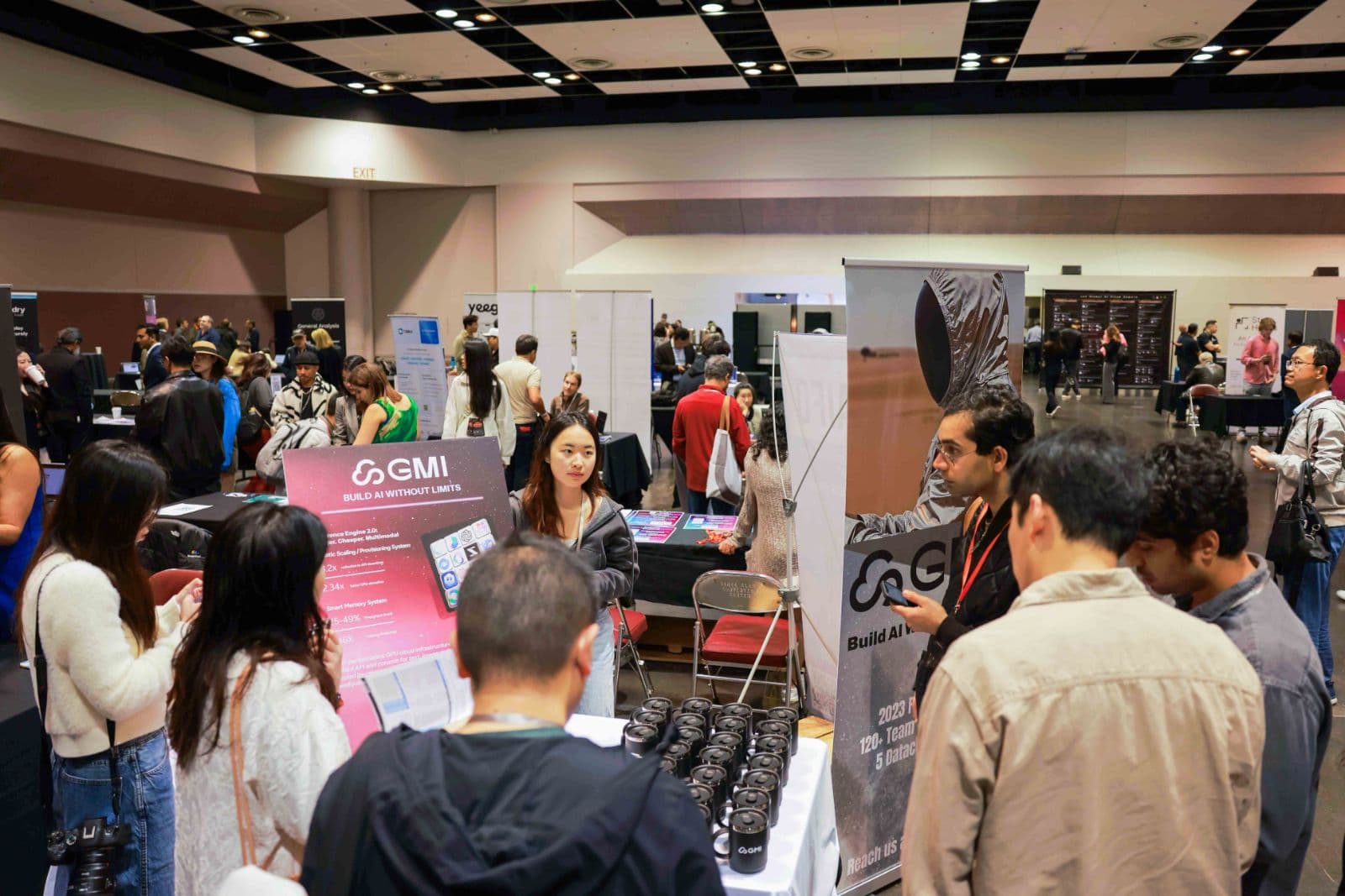 Exhibitor booths and professional networking at Global AI Pitch Summit in Silicon Valley by JY Studio