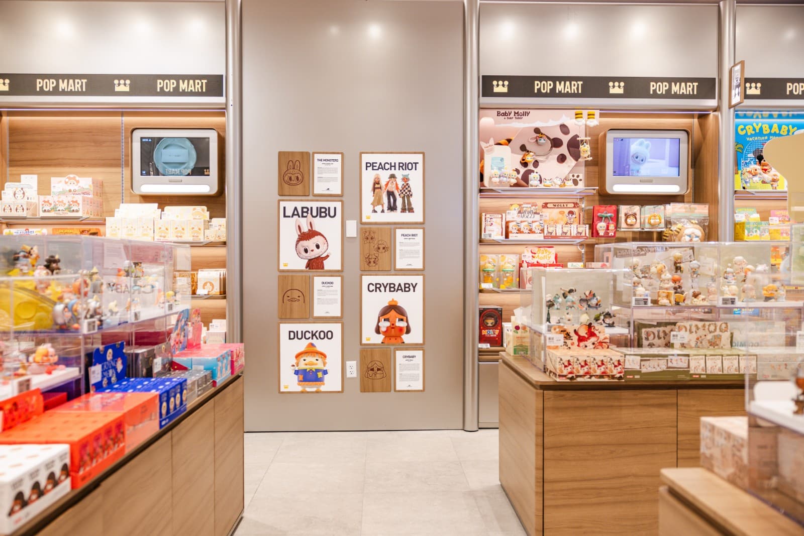 Pop Mart iconic collectible figures on display at Hillsdale Mall store opening in San Mateo by JY Studio