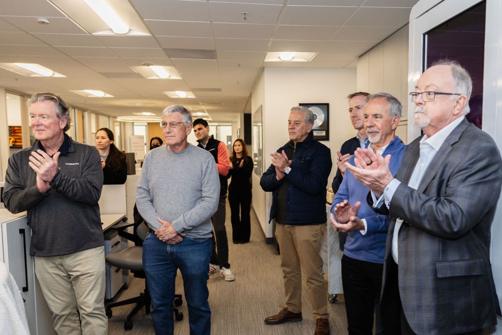 Guests celebrating together at milestone retirement party event in San Mateo by JY Studio